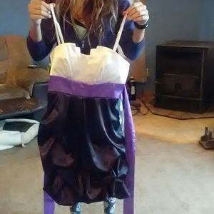 White and black dress with a purple sash